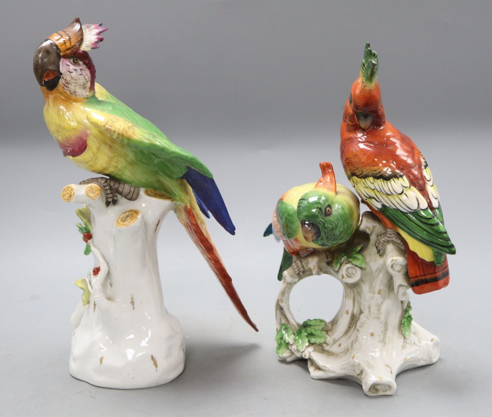 Two Continental porcelain Birds of Paradise groups, height 27cm